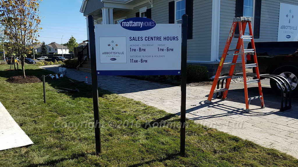 Sales Office Hours of Operation sign