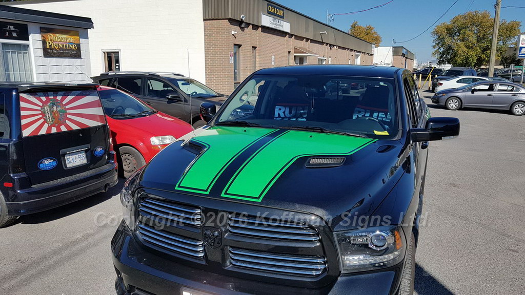 Custom green hood stripes for this Dodge Ram